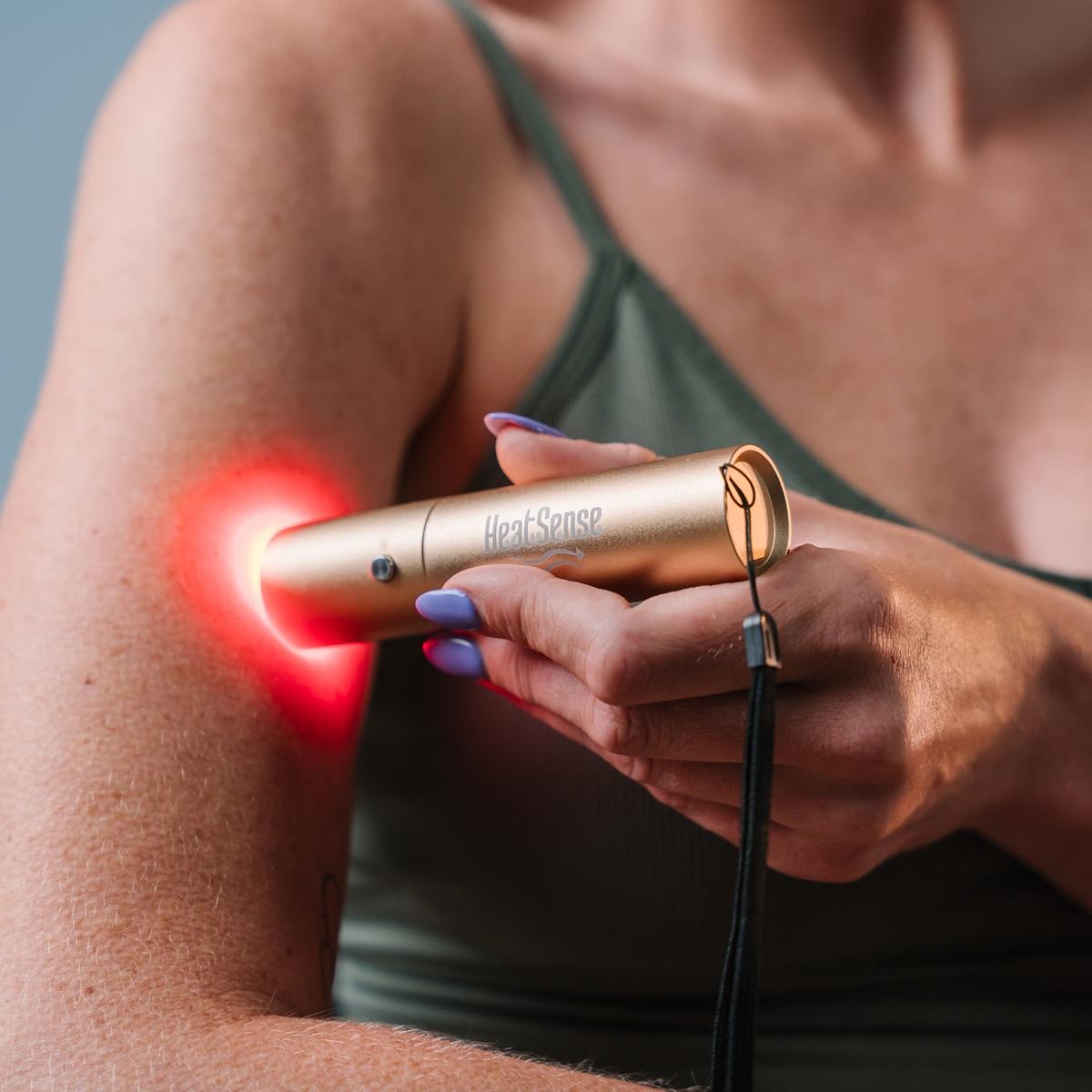 Håndholdt rød og infrarød lysterapi-pen fra Heat Sense til punktbehandling